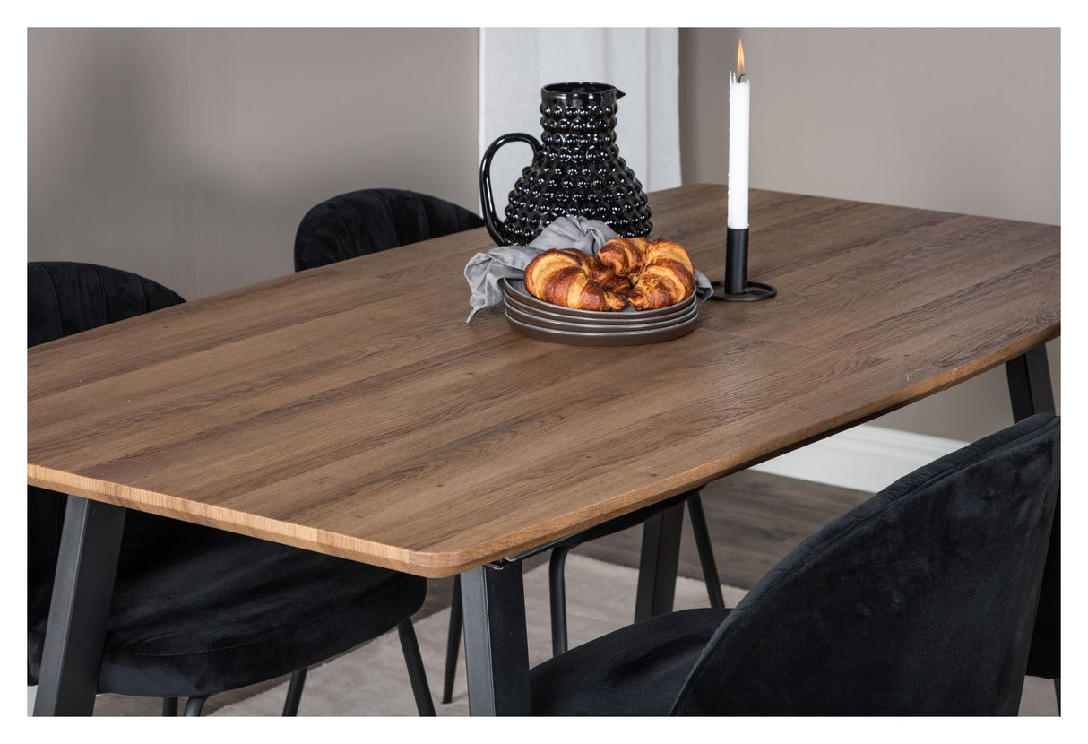 Inca Dining table with bow tie pull-out